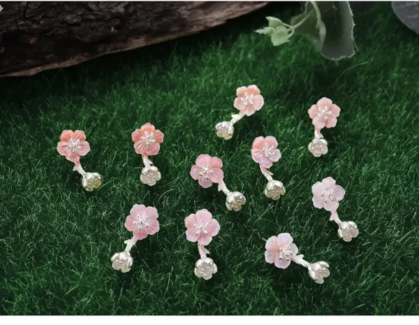 Boucle D'oreille Rose Poudré en argent et fleur en coquillage pour femme et enfants.